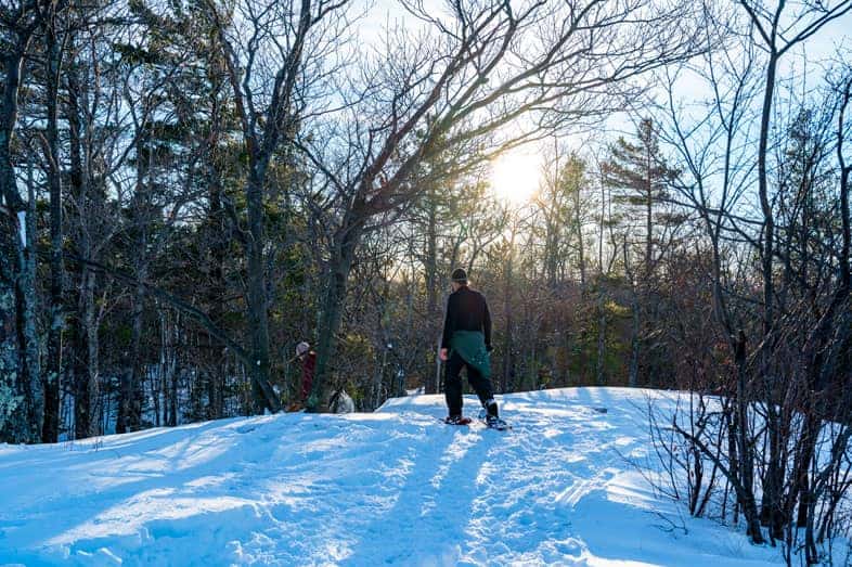 2 people Snow shoeing Marquette's winter trails
