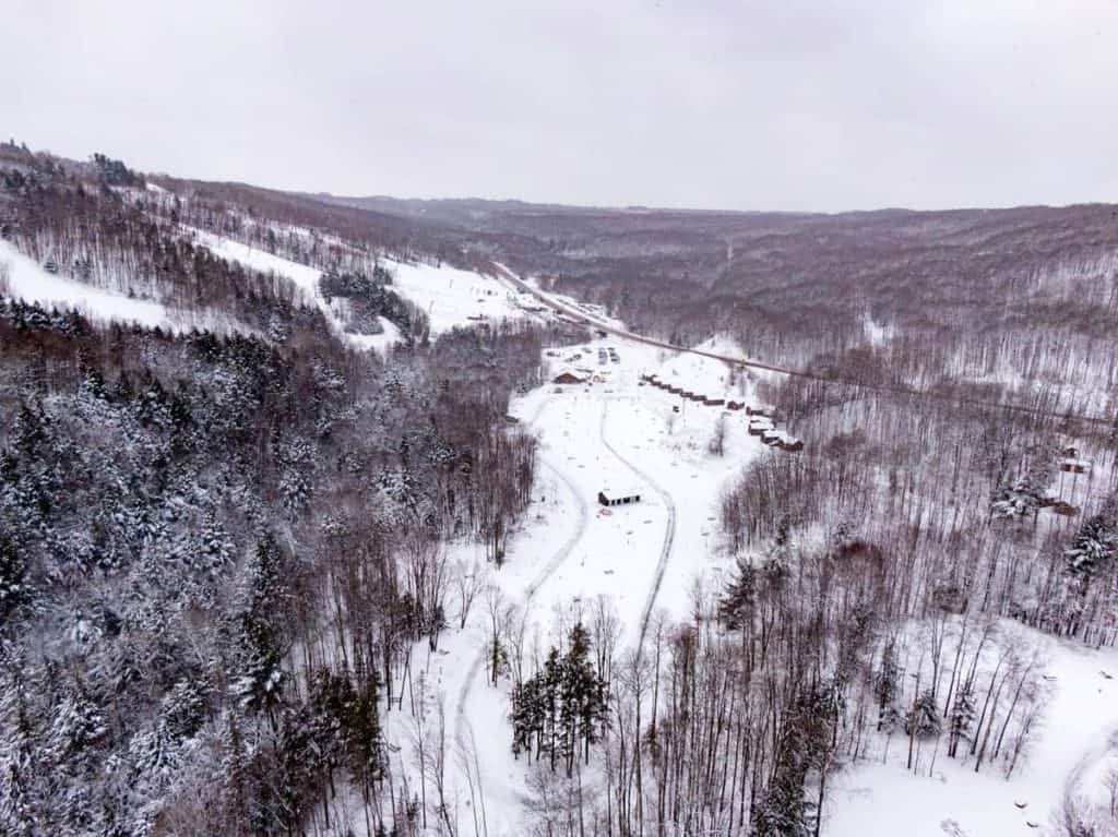 rippling river campground in winter drone shot