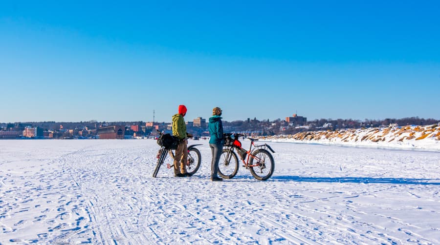 winter bike riding on lake superior in marquette