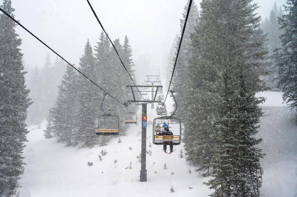 ski santa fe chair lift during storm